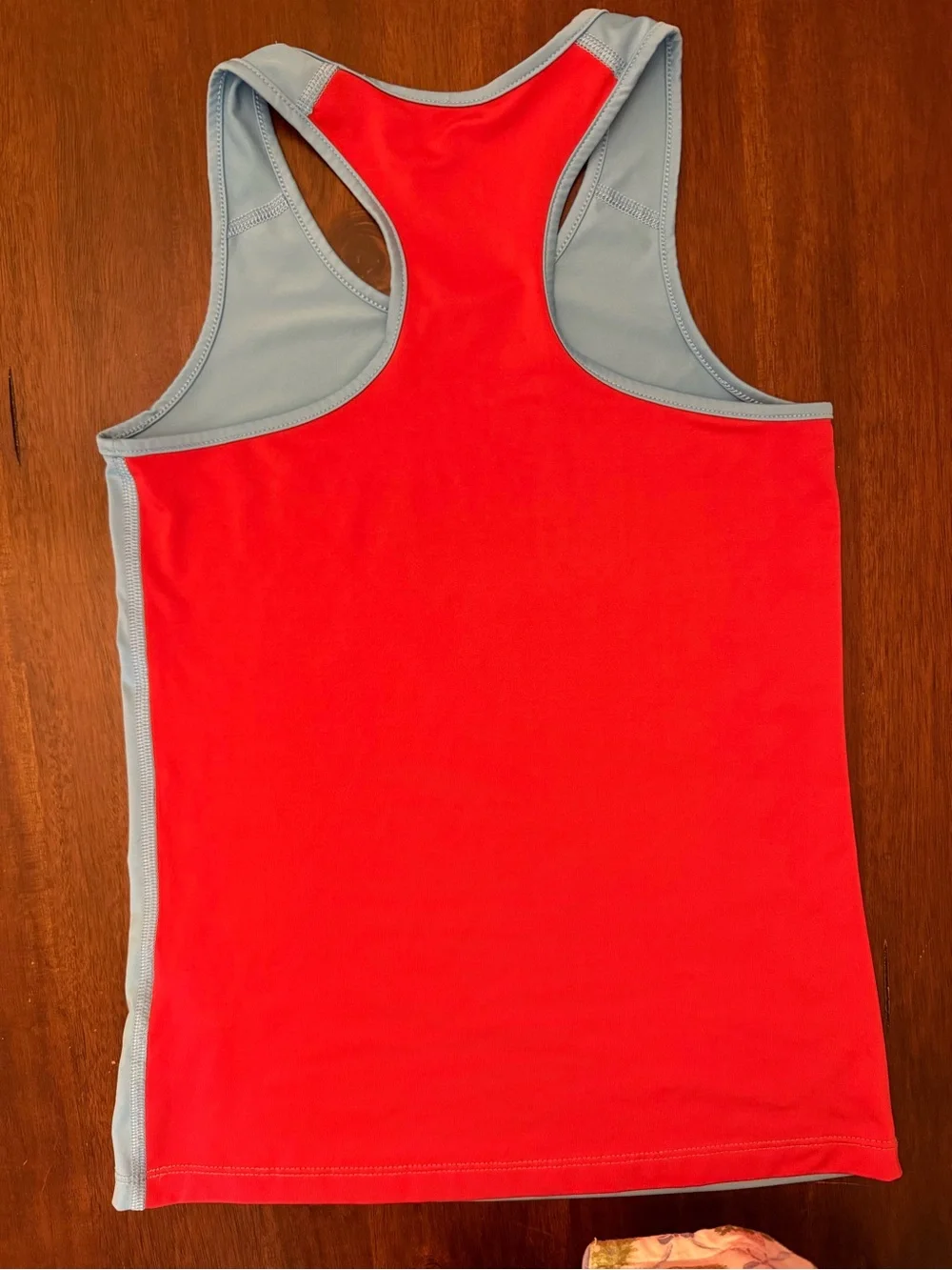 Nike Light Blue Racerback Tank with Red Interior and Yellow Swoosh